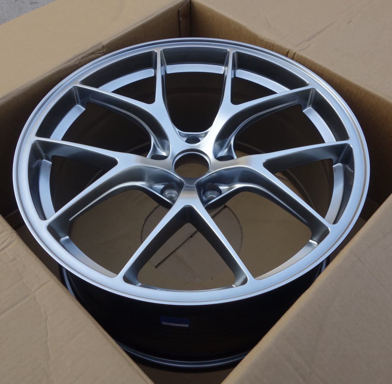 Swept split-spoke (BBS CI-R-inspired) aftermarket wheel